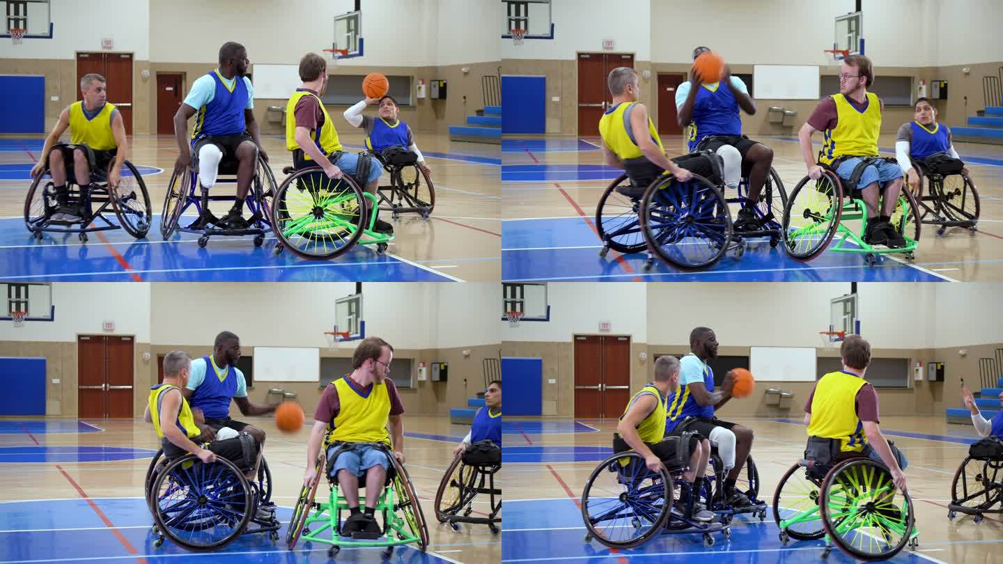 四名男子在轮椅上打篮球、传球和运球