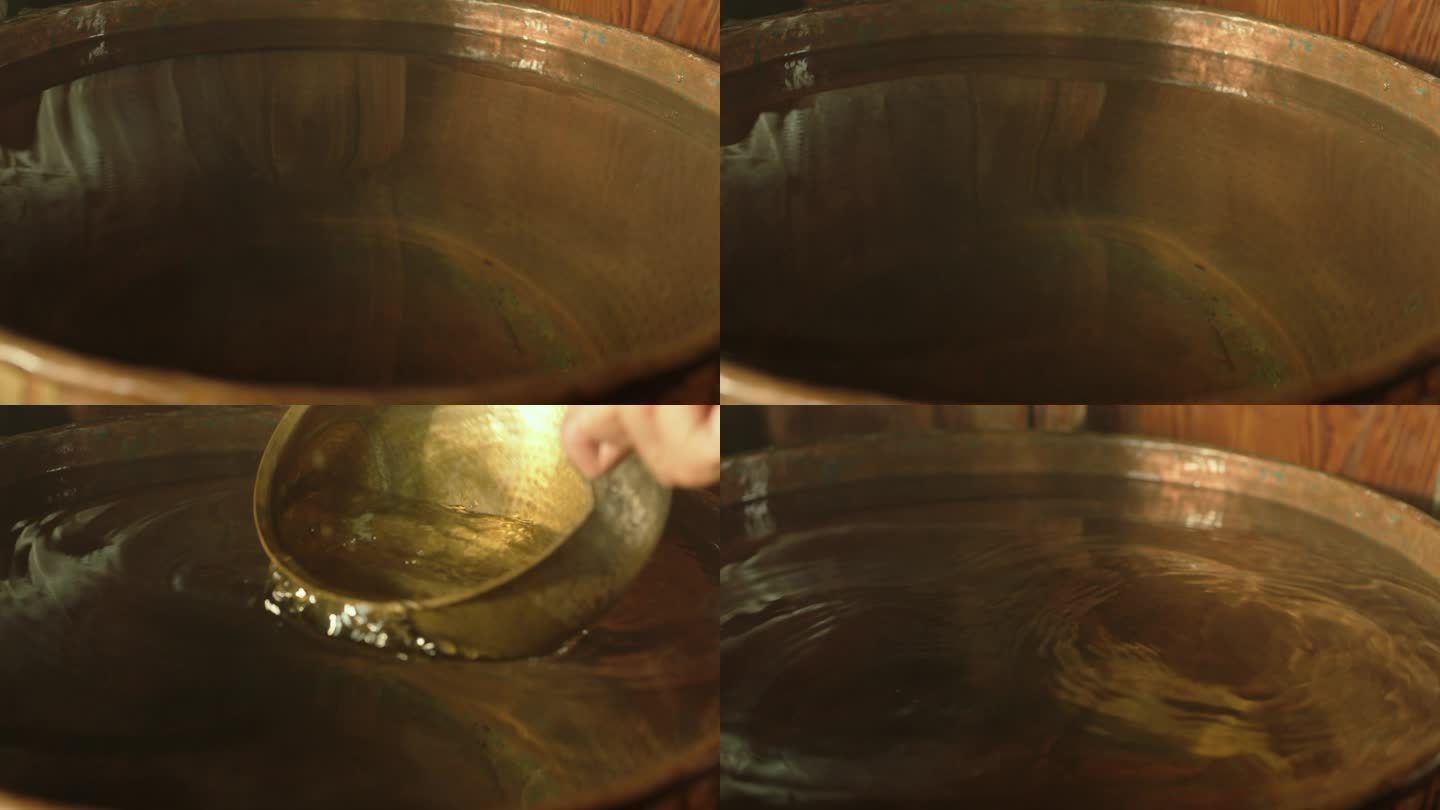 铜水瓢从铜水缸舀水
