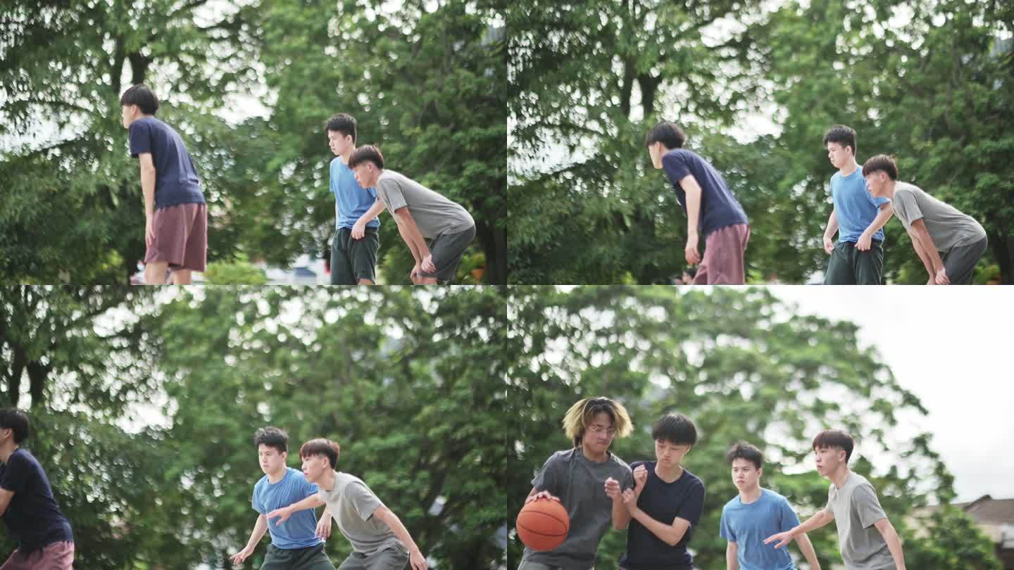 Z一代亚洲中国青少年男孩在周末早上与朋友一起练习篮球比赛，挑战球员并投篮