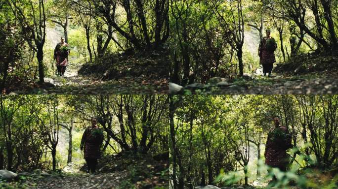 林间小路上行走的藏族汉子