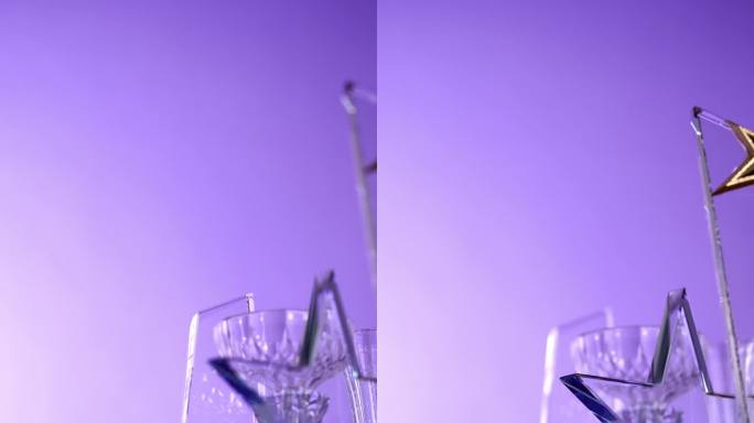 紫色背景下的一组水晶奖杯