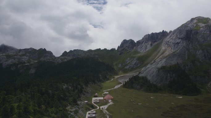 航拍山地平原五彩经幡