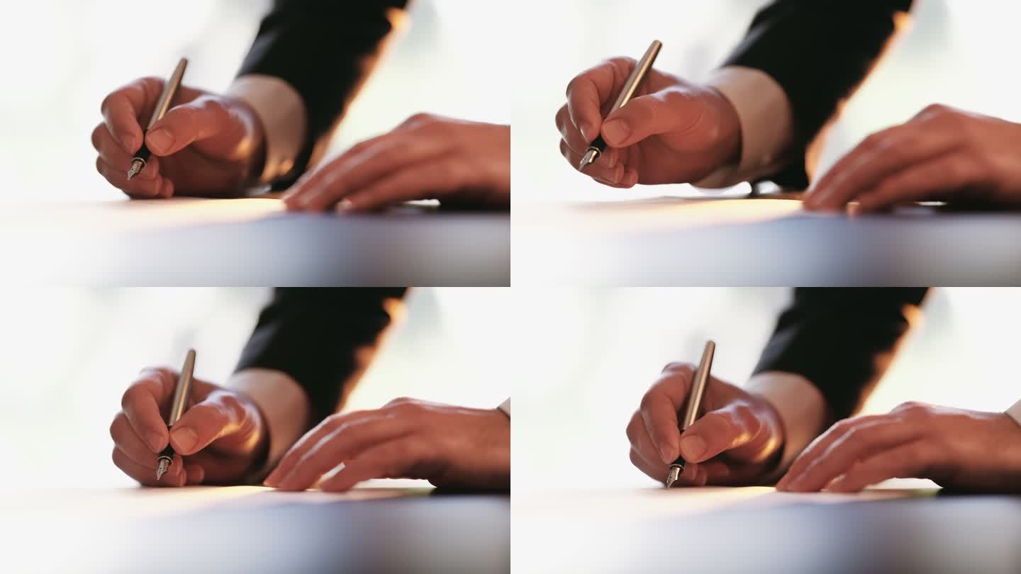 商人签署文件商人签署文件签字合作钢笔