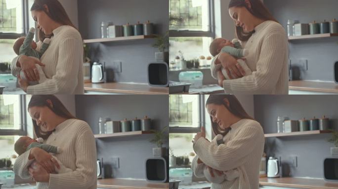 一名妇女在家与新生婴儿亲密接触的4k视频片段