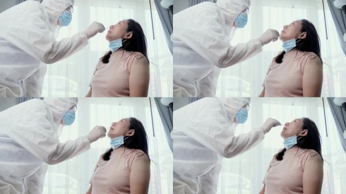 实验室工作人员用拭子采集鼻腔培养样本，以进行生化分析，并对covid-19进行取样。