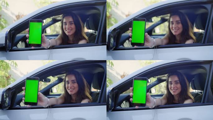 女性司机在手机中使用数字疫苗护照应用程序。身体探出车窗。屏幕上的色度键