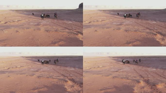 日落前，三位纳瓦霍姐妹在纪念碑谷附近的沙漠中牧马