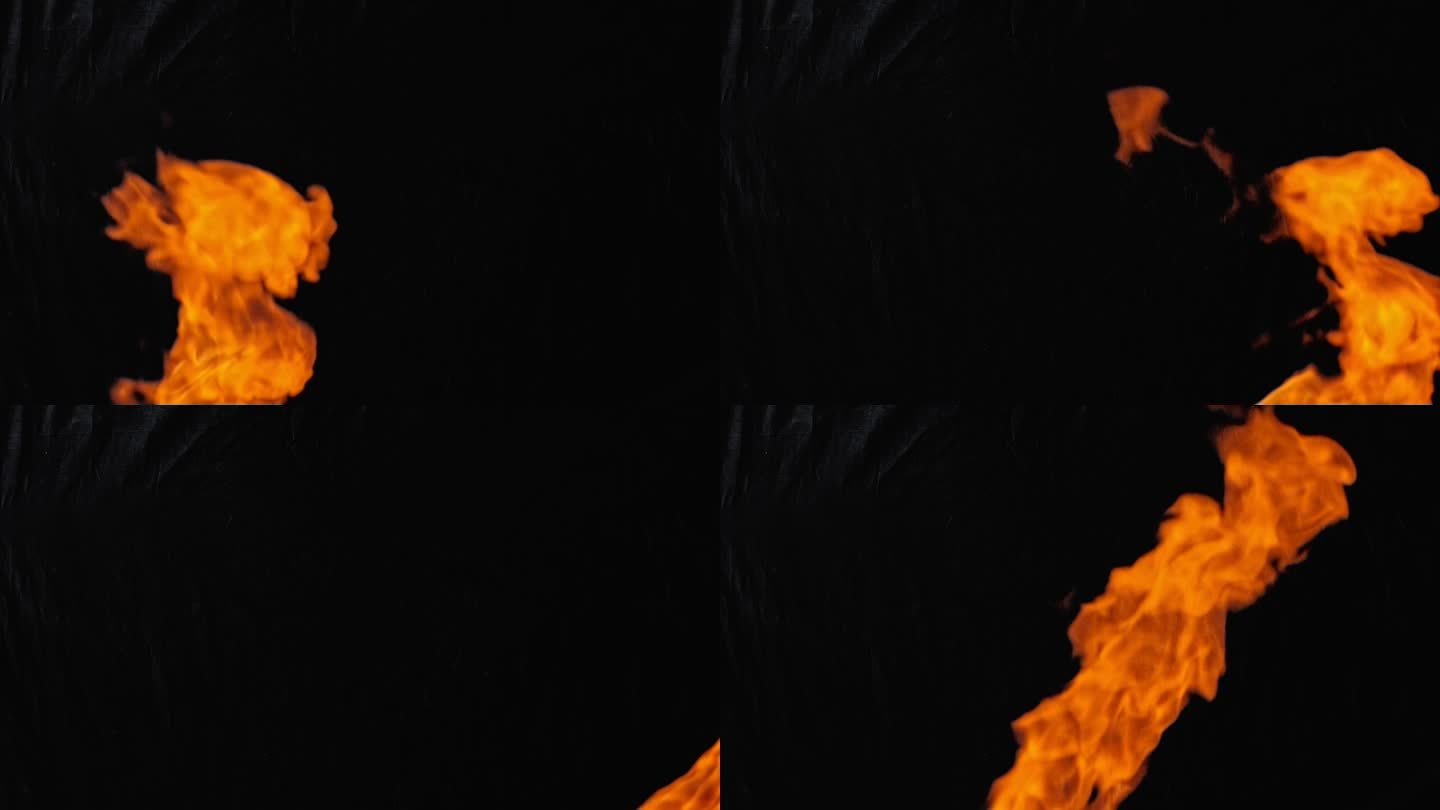 黑色背景上的火焰。色彩对比度高。从左到右，从下到上的垂直火焰。慢动作。