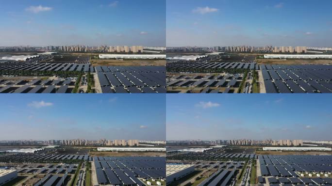 安装在工厂屋顶和停车场上的太阳能电池板的实时/鸟瞰图