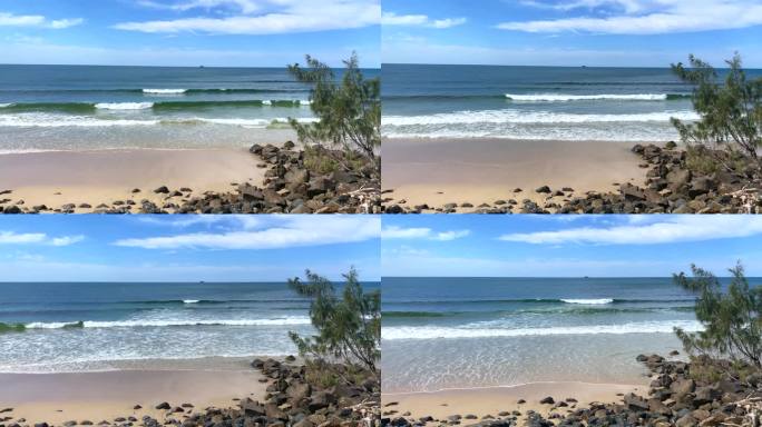 阴天平静的海浪沙滩海浪海水