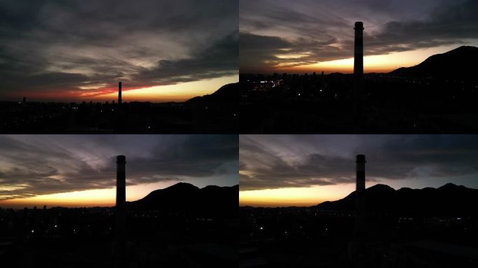 夕阳崂山城市烟囱航拍