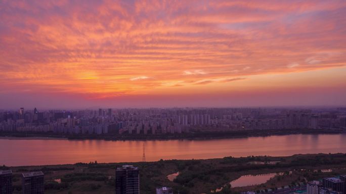 航拍延时临沂沂河晚霞城市风景