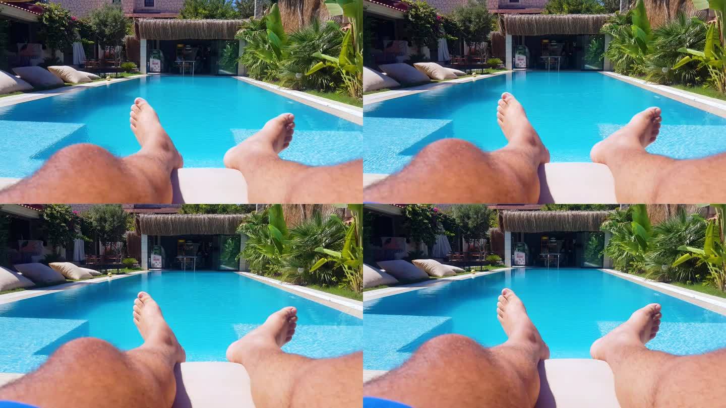 4k视频腿部放松视角：在游泳池中