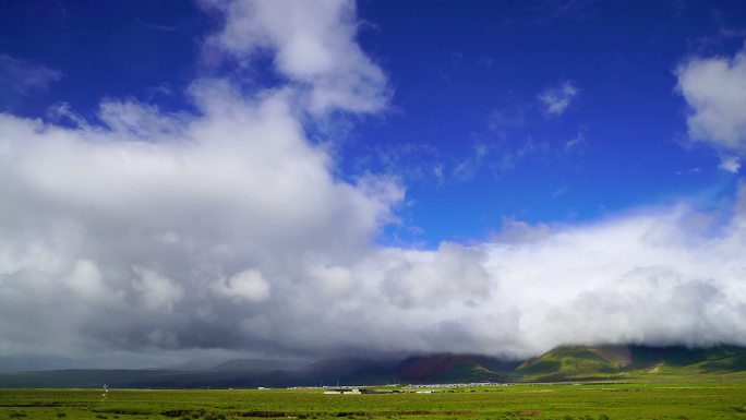 青藏高原西藏夏季绿草蓝天白云彩虹延时合集