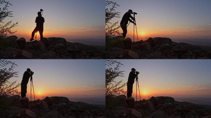 摄影师山顶拍摄日出