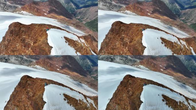 登顶沙鲁里山脉尼登贡嘎峰登山者