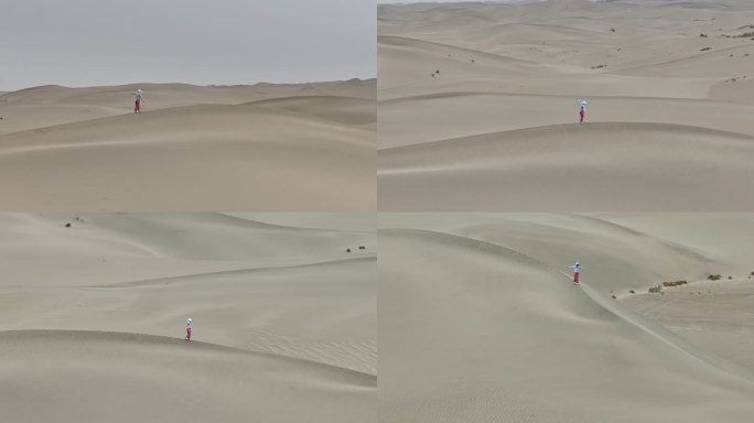 塔克拉玛干人在沙漠中行走