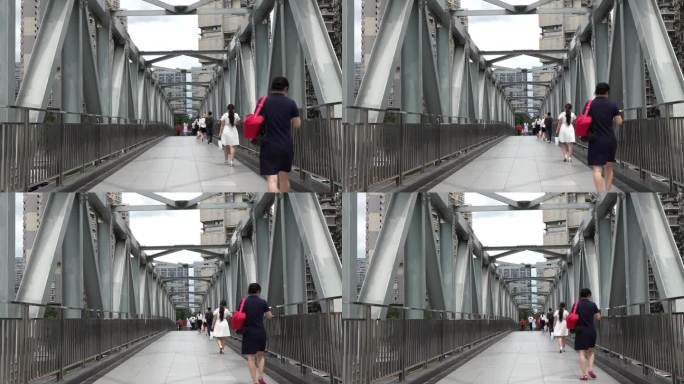 城市桥梁行人人来人往走路马路