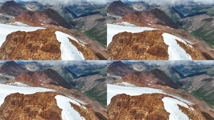 航拍登顶沙鲁里山脉尼登贡嘎峰登山者