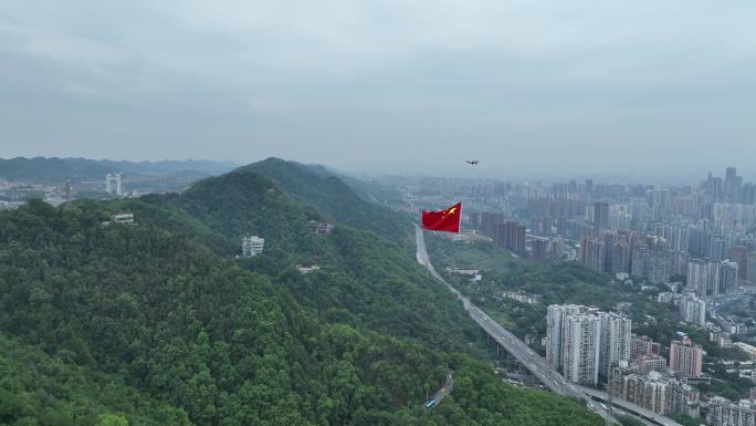 航拍国庆节五星红旗飘扬在重庆