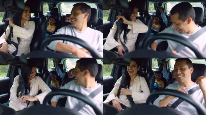 一个美丽的拉丁美洲家庭，两个孩子系好安全带，准备开车旅行，他们看起来都很兴奋