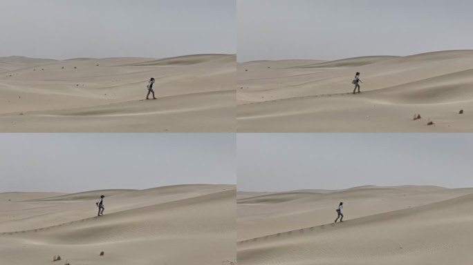 沙漠中女孩独自一个人行走