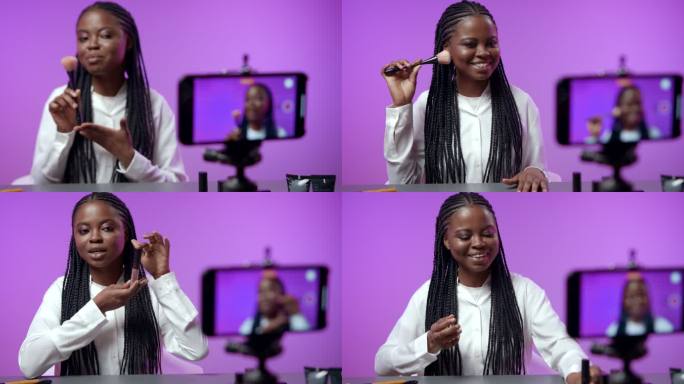 一位面带微笑的黑皮肤女人录制了一段视频，解释如何化妆