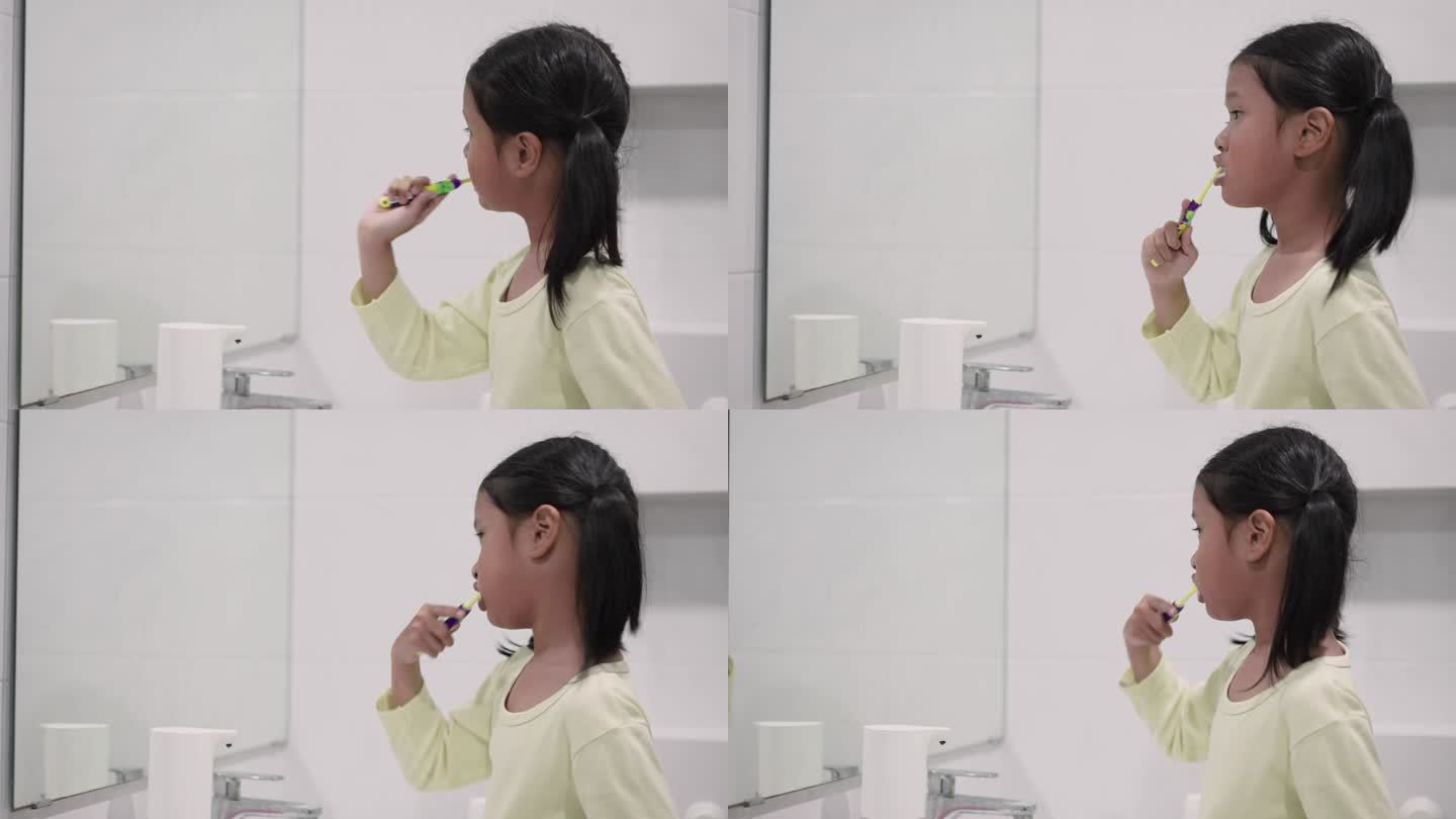 一个女孩在浴室刷牙