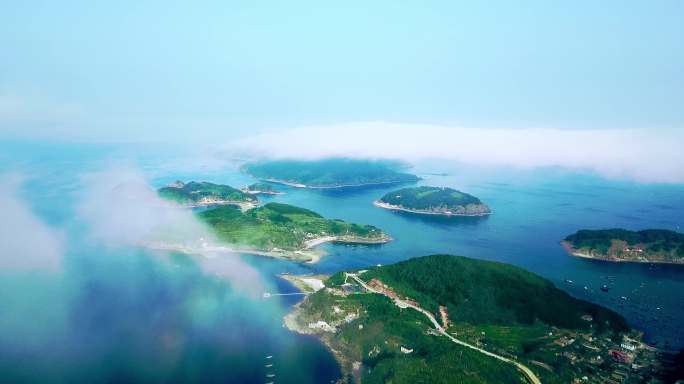 长山群岛海浪拍打礁石港口日出