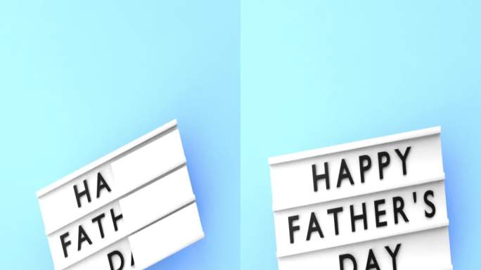 蓝色背景上的灯箱上以4K分辨率显示垂直的“父亲节快乐”文本