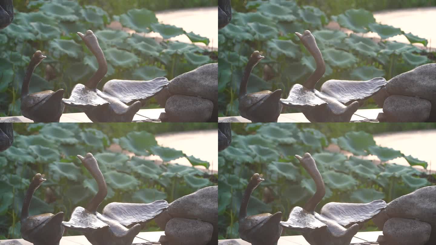 绍兴兰亭公园书法家王羲之鹅雕塑铜像夕阳