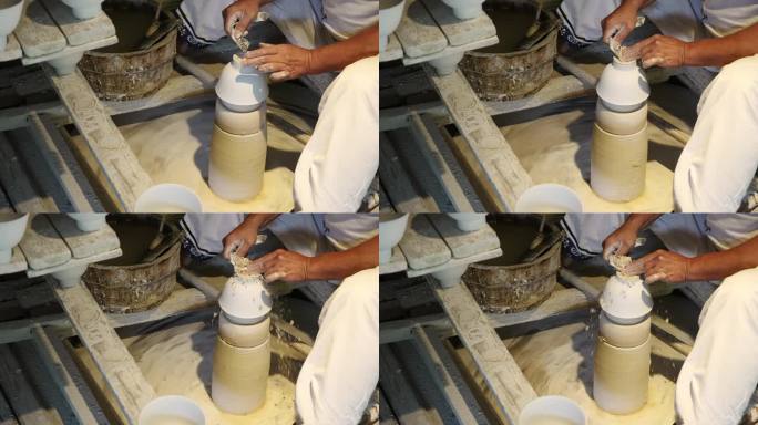陶艺工人手工制作瓷胚