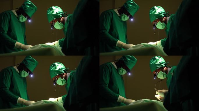 医疗队在手术室使用现代放大镜进行手术