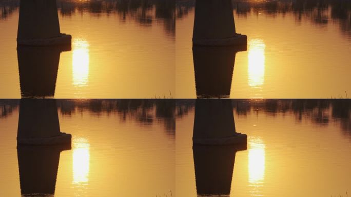 夕阳下波光粼粼的水面唯美空镜