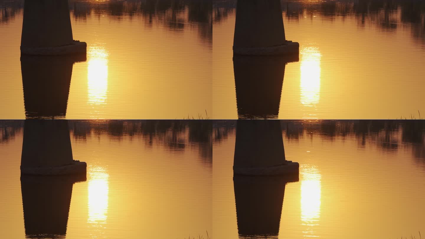夕阳下波光粼粼的水面唯美空镜