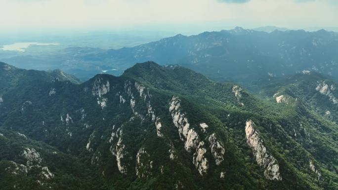 航拍阳光照在大山上