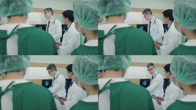 医生团队在手术前在患者床边开会。