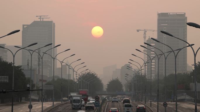 北京北三环路上空的日出延时拍摄