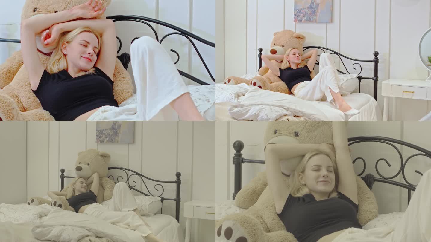 外国美女舒服躺在床上升格慢镜头视频素材