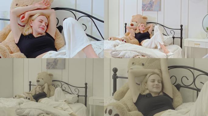 外国美女舒服躺在床上升格慢镜头视频素材