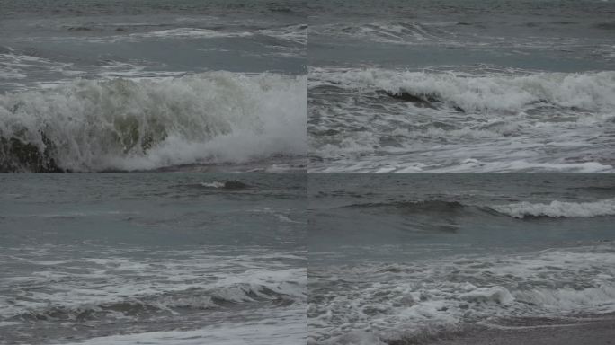 扑向海滩的大浪海浪浪花波涛汹涌的海面