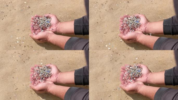 小塑料碎片漂浮在海水中，也称为微塑料污染。