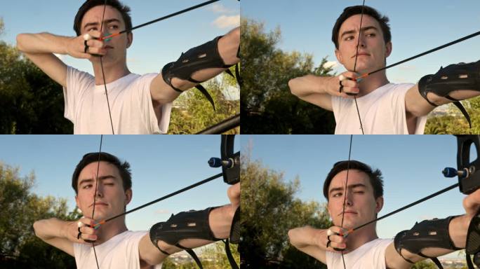 一名男子弓箭手瞄准准备射击的4k视频片段