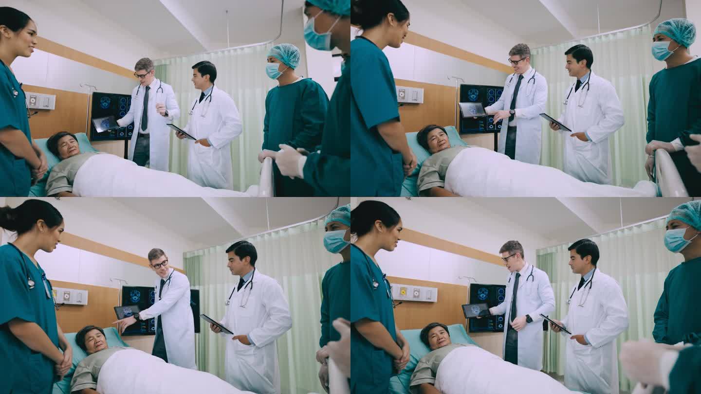 外科医生与医科学生讨论监控病人。
