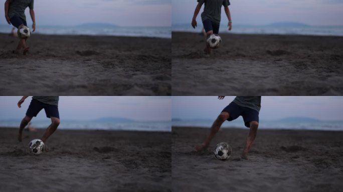 青少年在海滩上踢足球