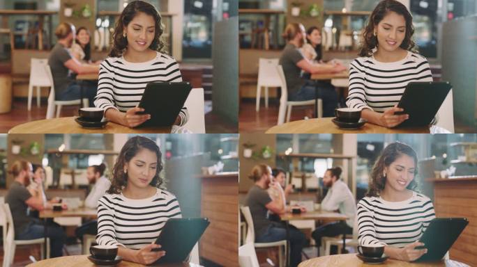 一名年轻女子在咖啡馆喝咖啡并使用数字平板电脑的4k视频片段