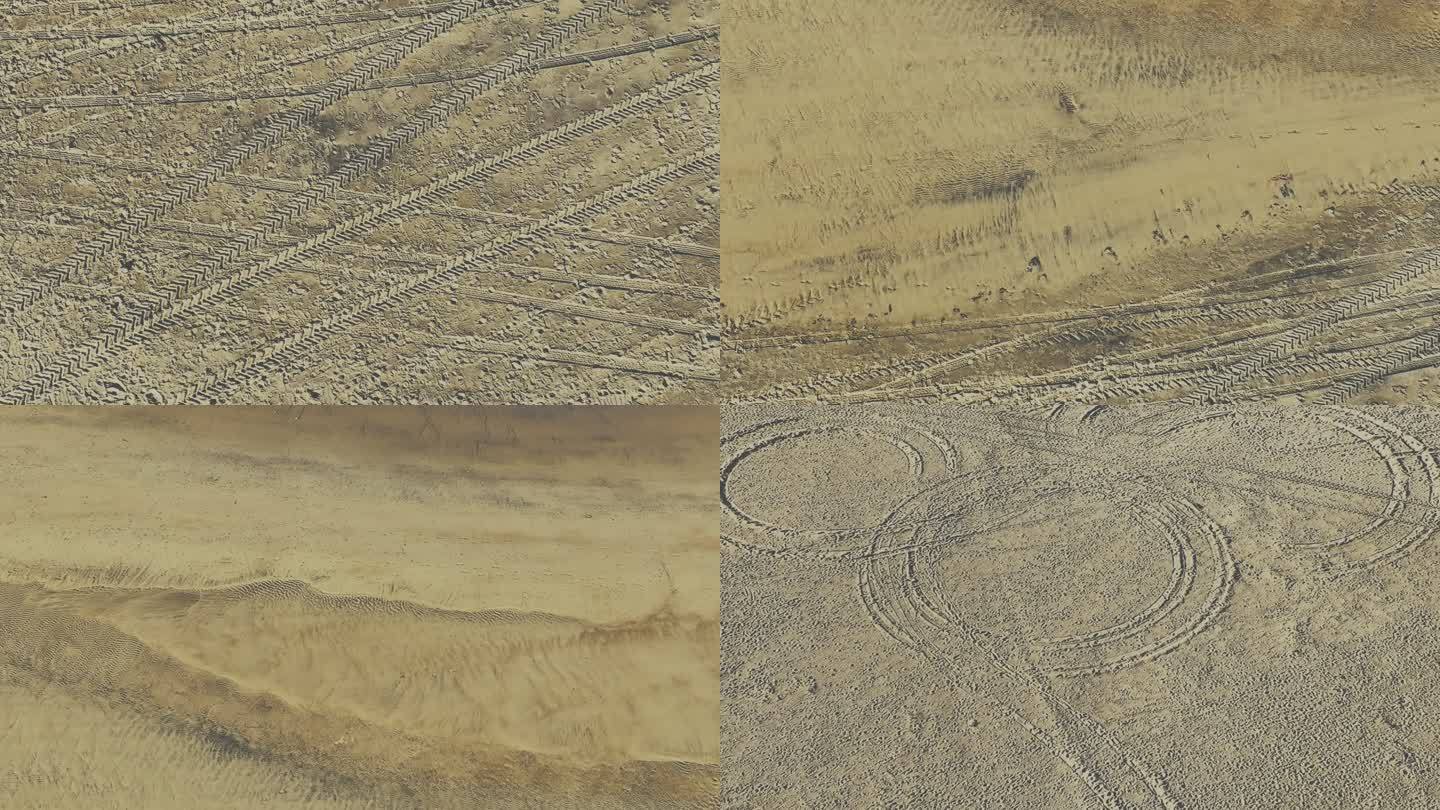 沙地上的车胎印迹