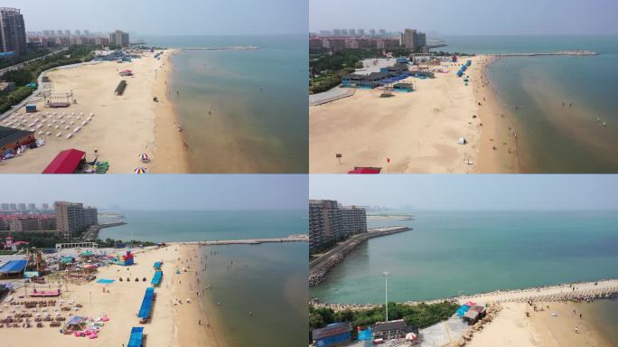 海边沙滩游客建筑推进4k航拍