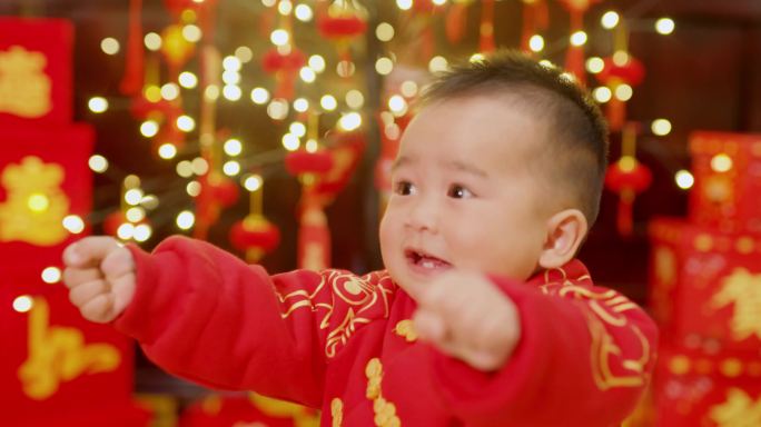 贺岁 盆栽 喜庆 玩耍 婴儿 新年 春节