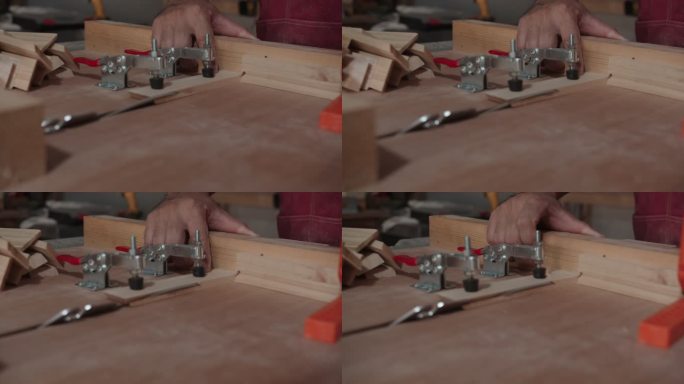 技术木匠，拿着木材零件木材材料锯一张木板